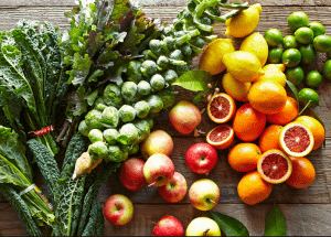 a group of fruits and vegetables on a wood surface Healthy Weight Loss Diets Bordesley